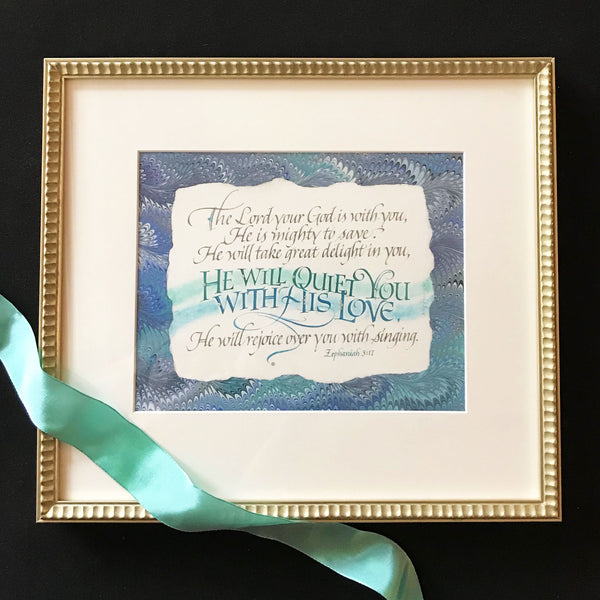 He Will Quiet You from the book of Zephaniah is a beautifully hand lettered framed calligraphy design.